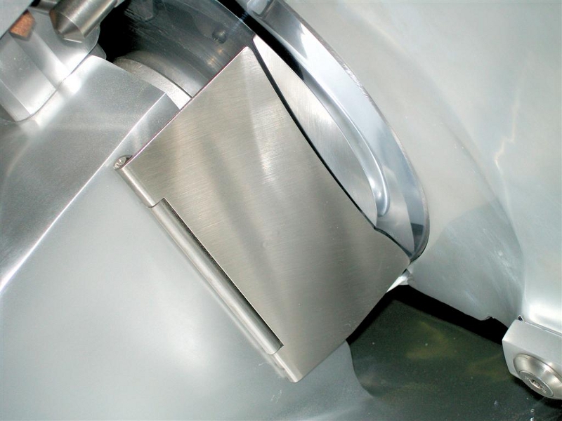 Parafetta aprbile in acciaio INOX per affettatrici Parafetta aprbile in acciaio INOX per affettatrici